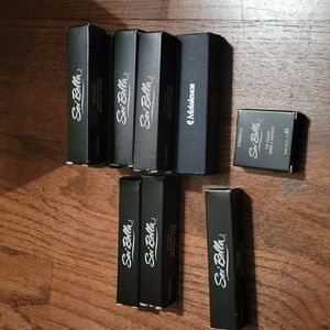 Lot of Sei Bella lip gloss